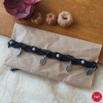 Black anklet
