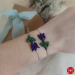 Tulip purple hand
